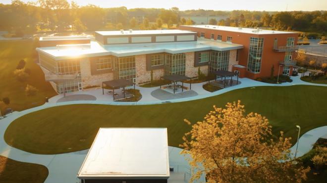Photograph of the Lake Villa District library building and outdoor space from above. 